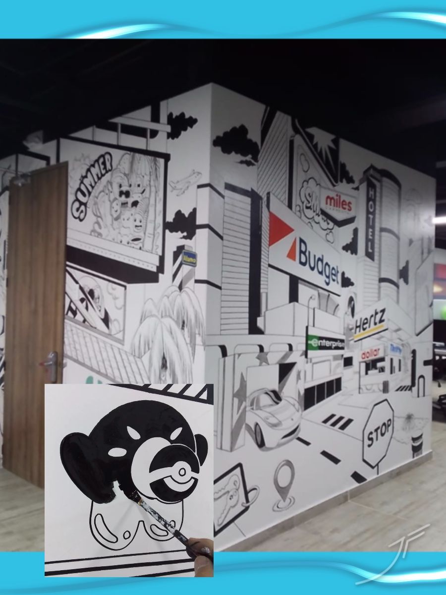 Mural en blanco y negro de una ciudad con edificios, carros y letreros en una oficina